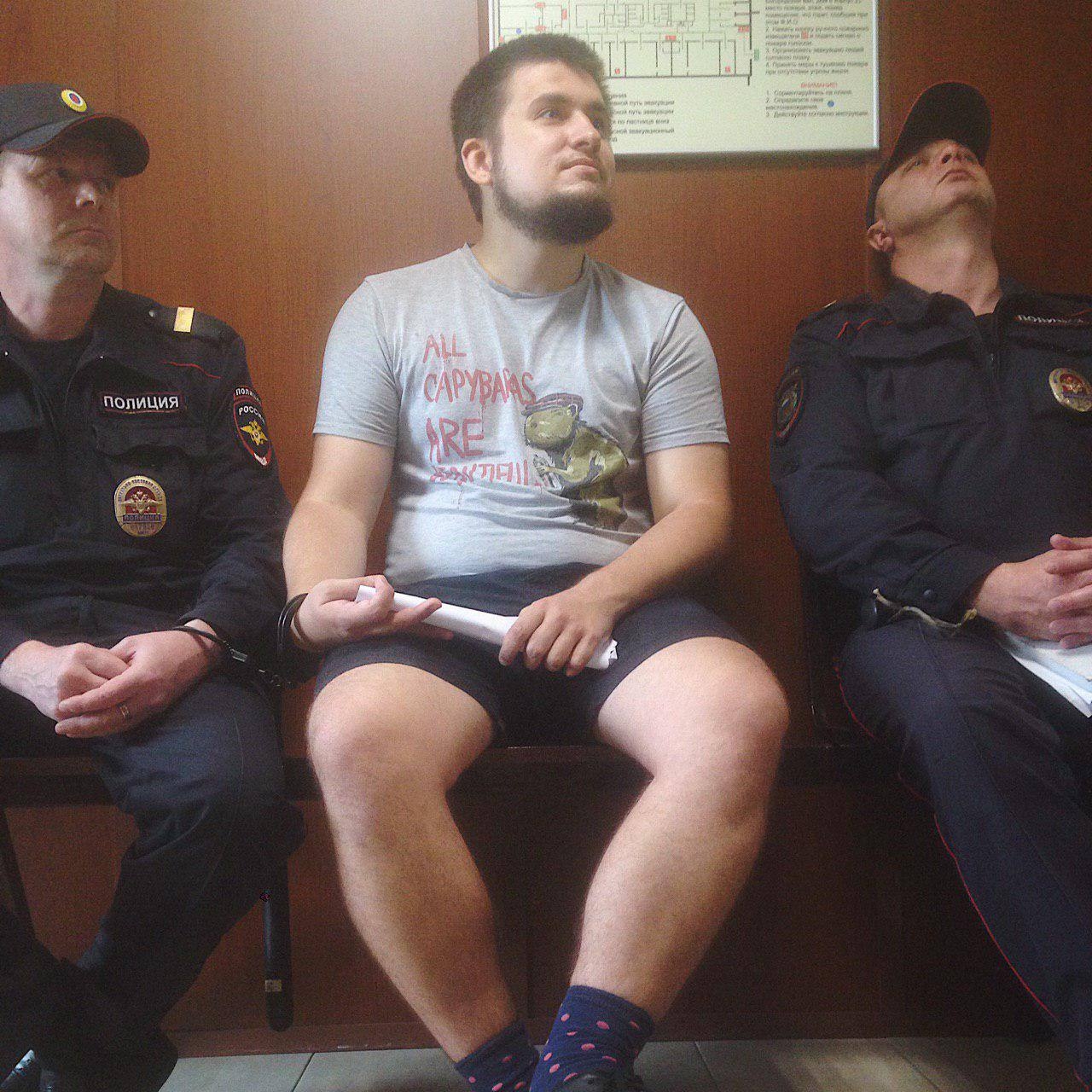 Алексей Полихович (в центре) в 2019 году / ОВД-инфо